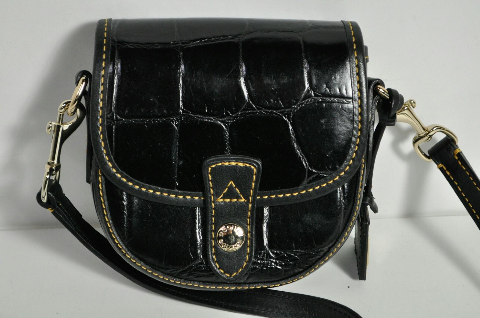 Dooney & Bourke Black Small Button Long Strap Crossbody Bag Purse | eBay